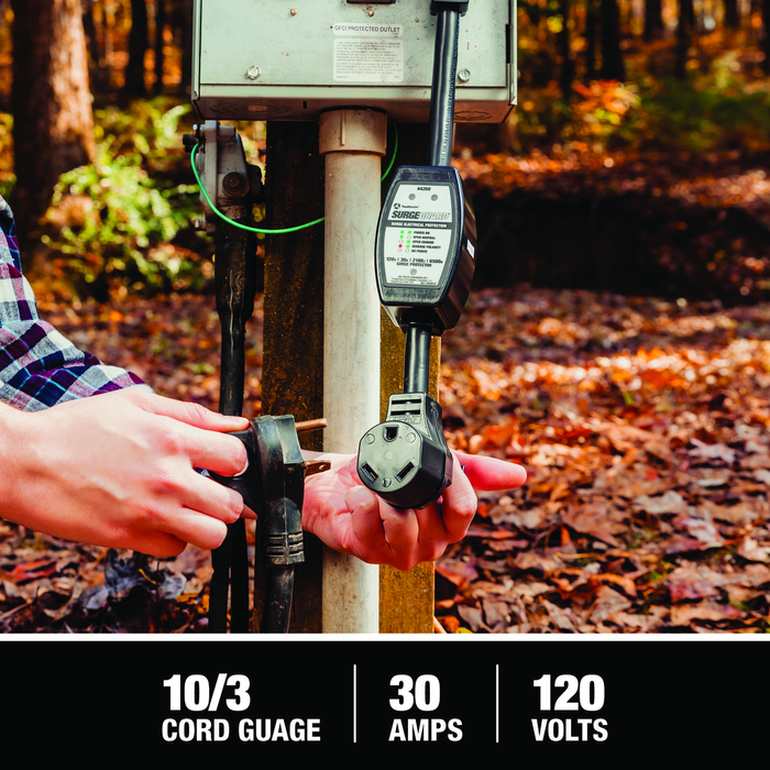 plugging in a 30 amp camper power cord into the surge protector with information about cord gauge, volts and amps