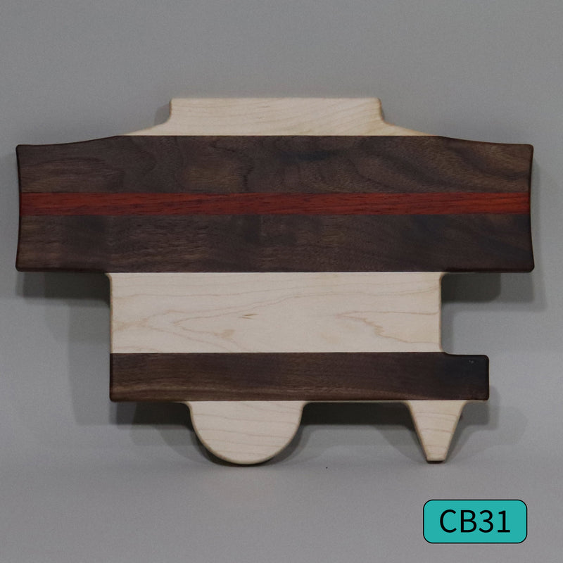 A wooden cutting board with a unique shape, featuring dark brown bands and light beige strips, displayed against a grey background with the label 'CB21' at the bottom right corner.