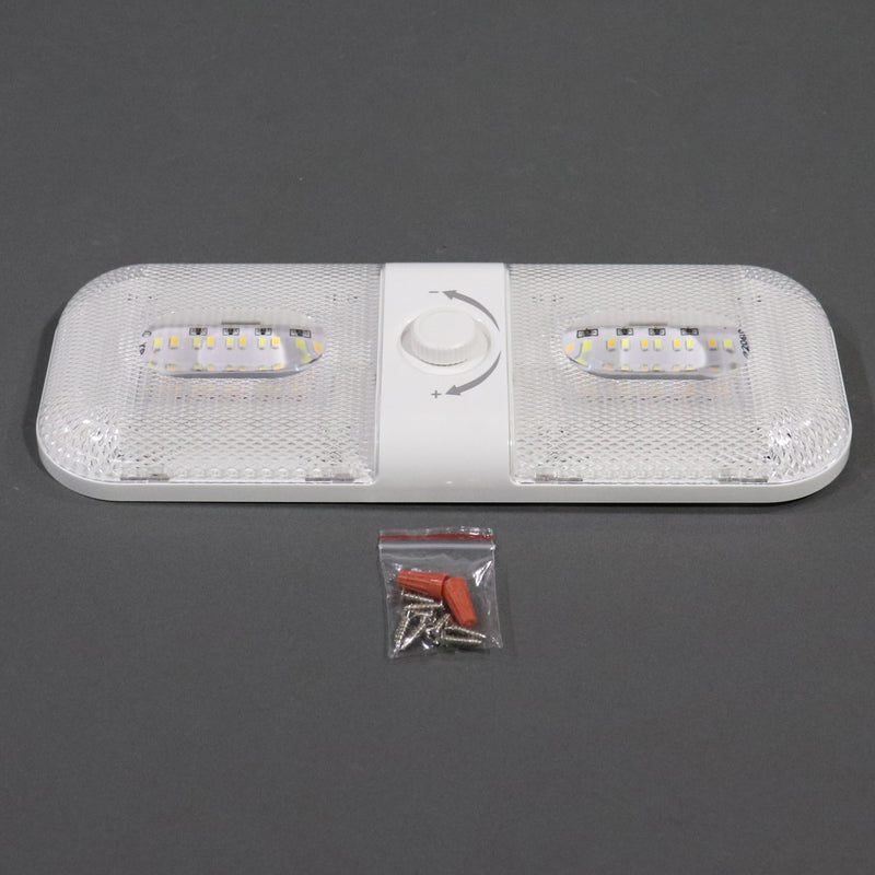 A white LED ceiling light with clear diffuser style lenses and installation hardware included.