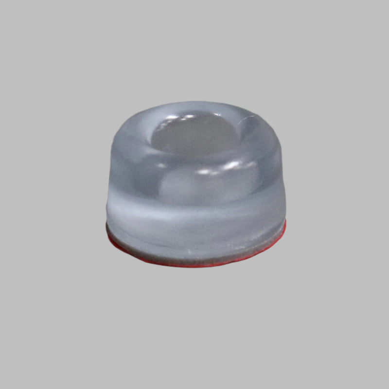 A clear rubber bumper dimple with a red base, designed for use as a bumper stop or awning rafter pole.