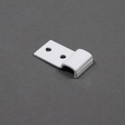 A white metal bracket with two holes for attachment, viewed from an angle against a grey background.