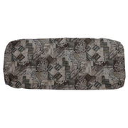 A cushion cover with a multicolored pattern featuring a combination of solid colors and geometric designs.