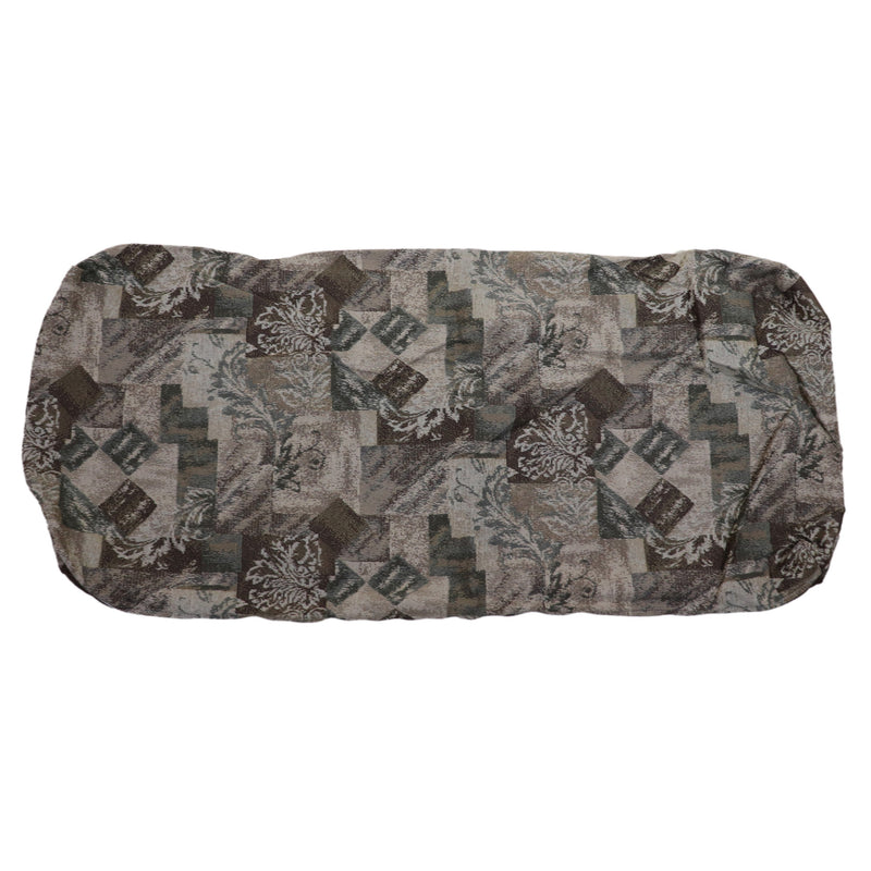 A multicolored cushion cover with a mix of solid colors and patterned sections, presumably designed for a seat or dinette area in a recreational vehicle.