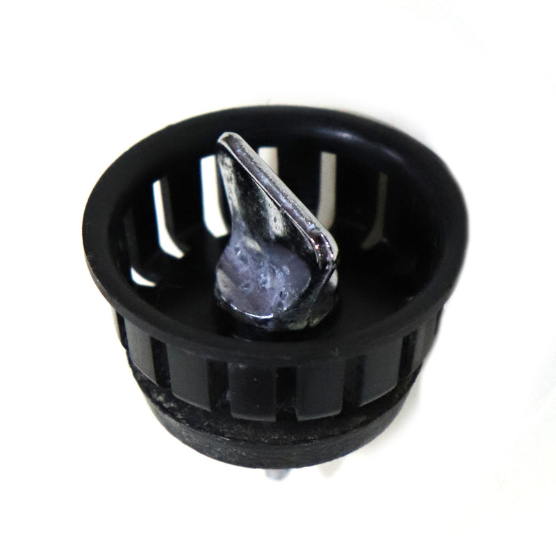 A black plastic sink strainer crumb basket.