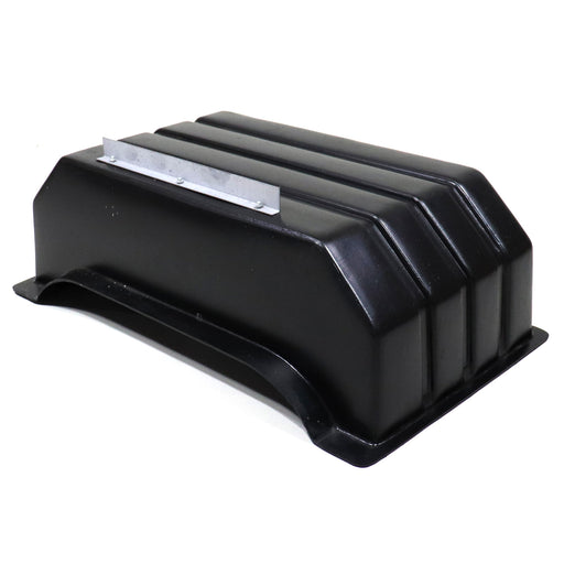 Black plastic wheel well guard, used for a vehicle.