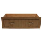 A beige wooden cabinet drawer with metal handles for pop up campers