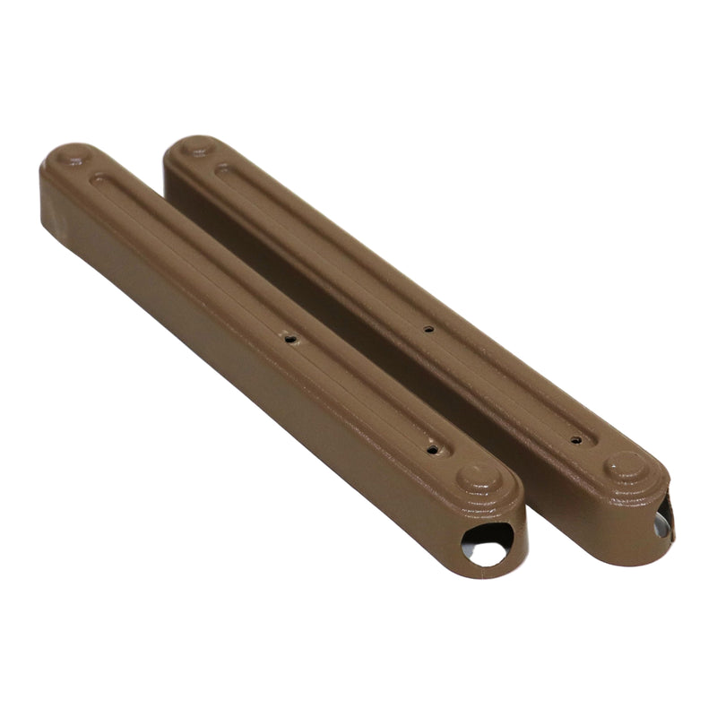 Two tan metal chain guards for galley sink lift systems.
