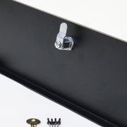 Black storage door with a visible keyhole, made of metal, shown from the back