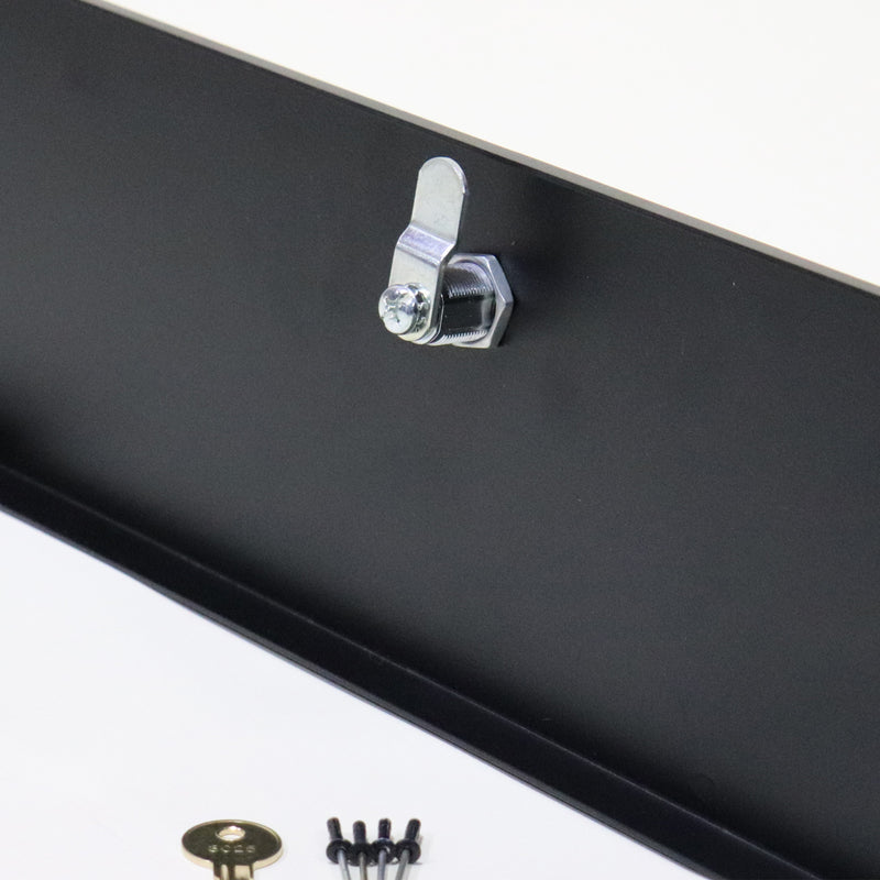 Black storage door with a visible keyhole, made of metal, shown from the back