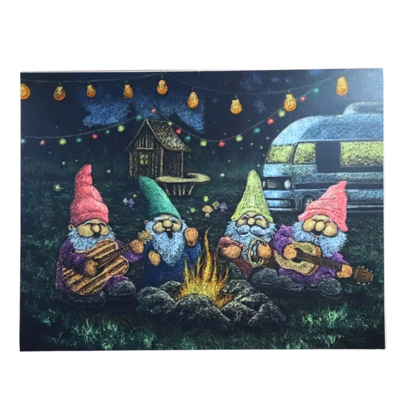 A decal featuring four colorful gnomes sitting around a campfire with a camper and trees in the background.