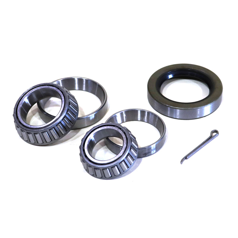 Set of mechanical bearings and a pin on a white background