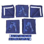 Set of blue pop up camper curtains with patterns on a white background