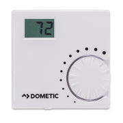 Dometic thermostat with digital display and dial on a white background