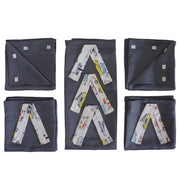 set of folded pop up camper curtains with vehicle pattern ties