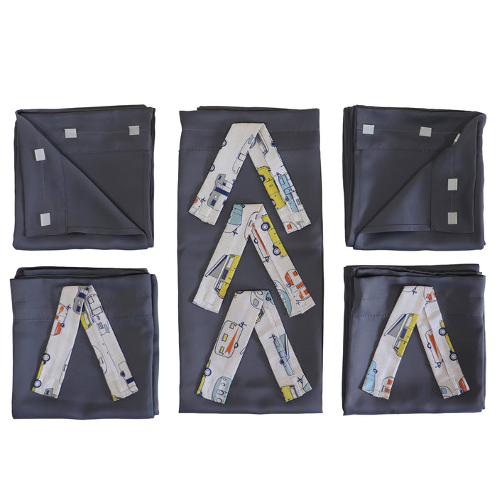set of folded pop up camper curtains with vehicle pattern ties