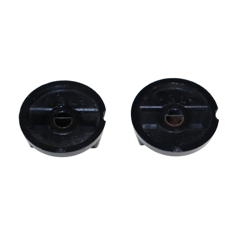 Two black plastic components on a white background