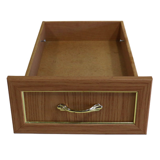 Wooden drawer with a gold handle on a white background