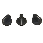 Three black knobs with white accents on a white background