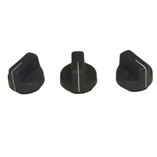 Three black knobs with white accents on a white background