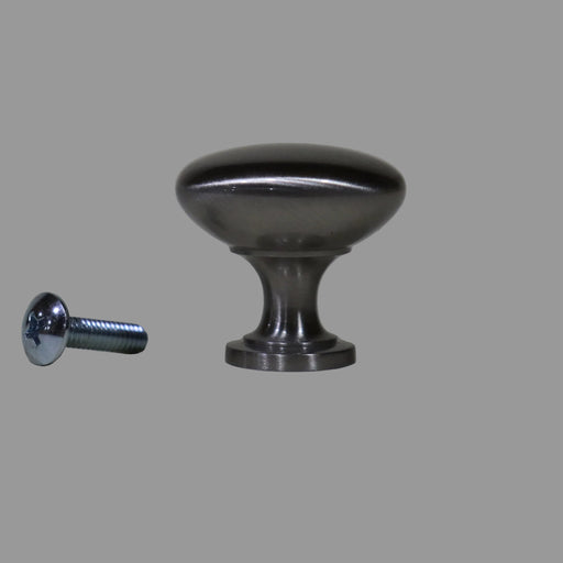 Nickle cabinet knob and screw on a gray background