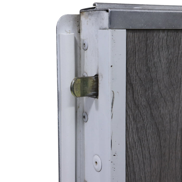 stepper door door lock bar shown exiting the side of the door frame