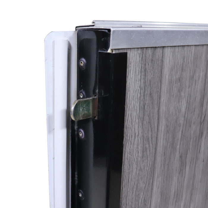 pop up camper stepper door showing the lock cam exiting the side of the door frame