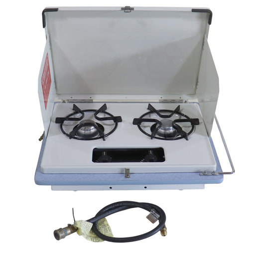 A portable two-burner gas stove with an open white canopy, black metal burner grates, and a separate black gas hose shown below on a white background.