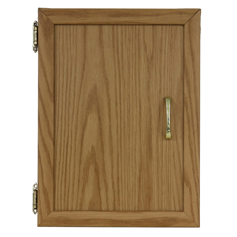 A single wooden cabinet door with a light oak wood grain finish, featuring a vertical brass pull handle and two brass hinges on the left side, shown against a plain white background.