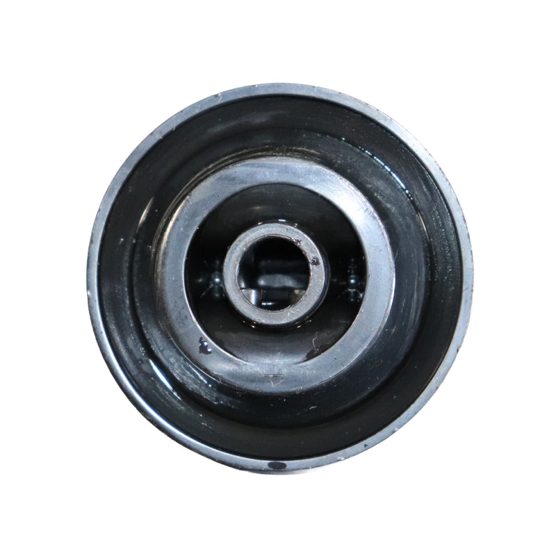 the bottom of a black plastic stove  knob shown against a plain white background.