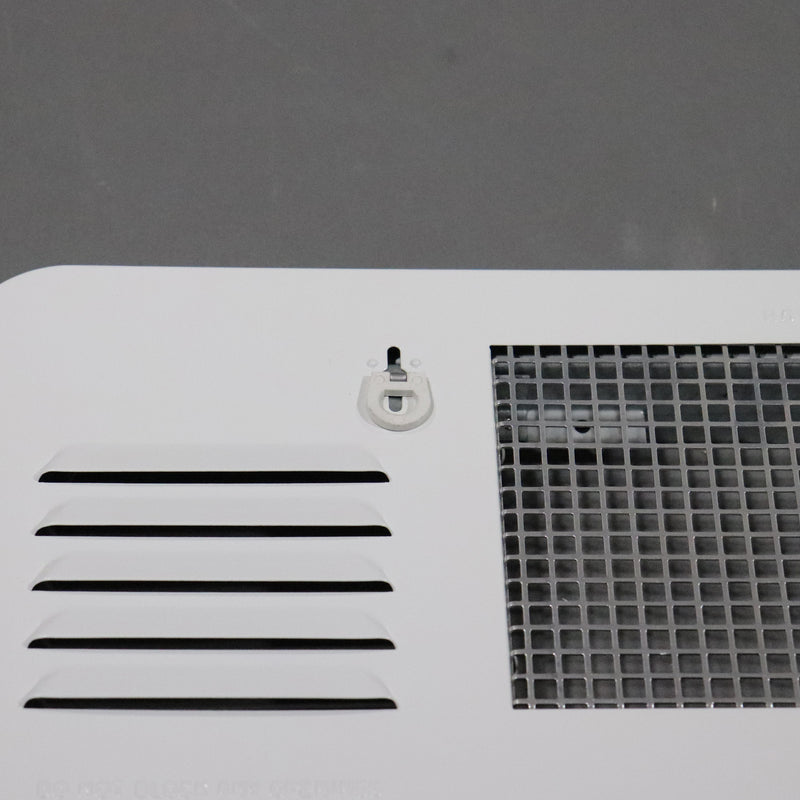 close up of the front of the door showing the latch cam and screen with vents