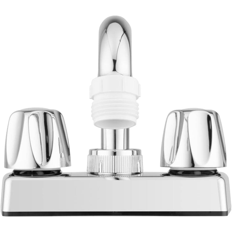 A close-up of a polished chrome faucet with two round handles and a central spout, shown against a plain white background.