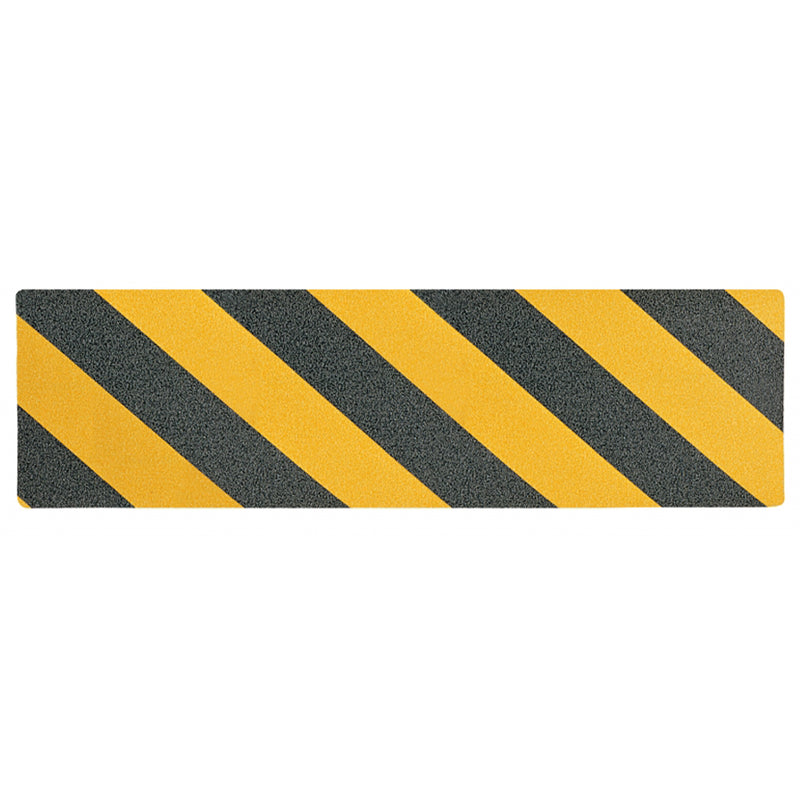 A strip of tread tape with yellow and black diagonal stripes, designed for use on RV steps to provide secure footing.