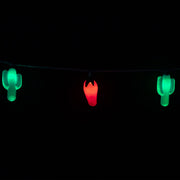 String lights with cactus and chili designs on a black background
