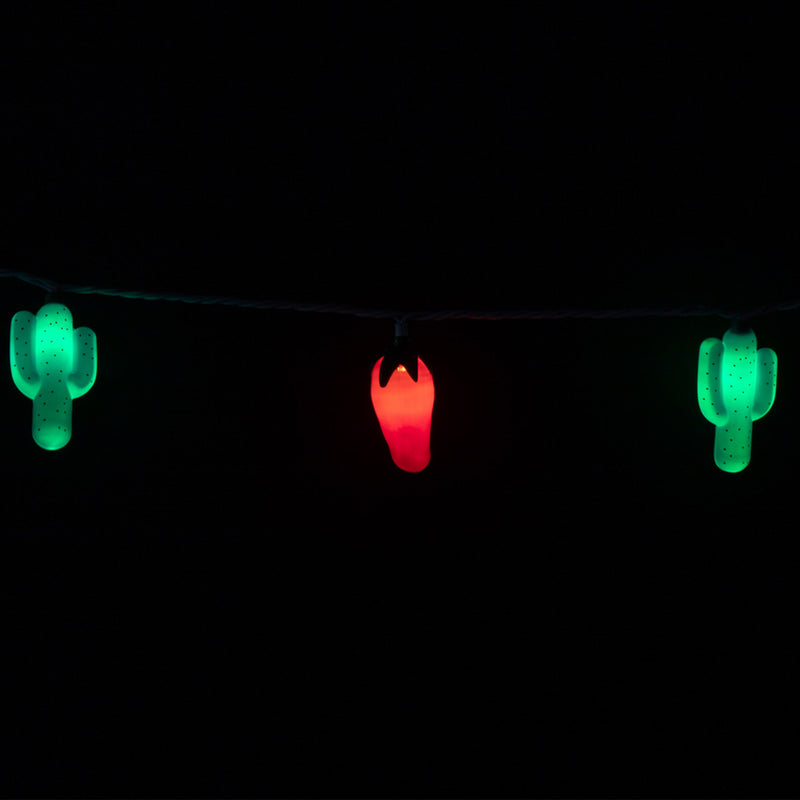 String lights with cactus and chili designs on a black background