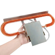 Hand holding a heat strip on a white background