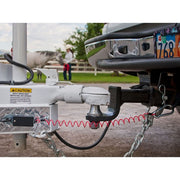 breakaway cable shown installed on a truck and camper