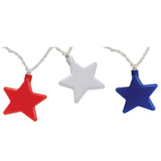 String lights with red, white, and blue star-shaped bulbs on a white background