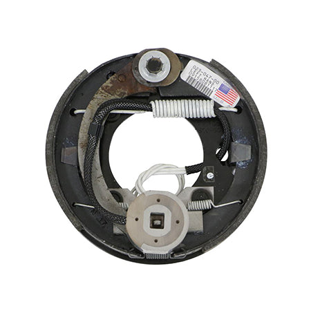 An image of a 7 inch by 1-1/4 inch brake assembly, featuring a backing plate, brake shoes, magnet, and springs for a camper.