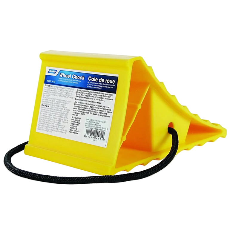 A yellow wheel chock with a rope designed for keeping trailers in place. It has a ribbed surface for better grip and is constructed of durable hard plastic.