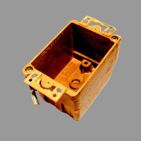 Brown electrical outlet box for standard 110 volt powered outlets.