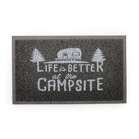 A gray rectangular door mat with the text 'Life is better at the campsite' printed in the center, featuring an illustration of a camping trailer and trees.