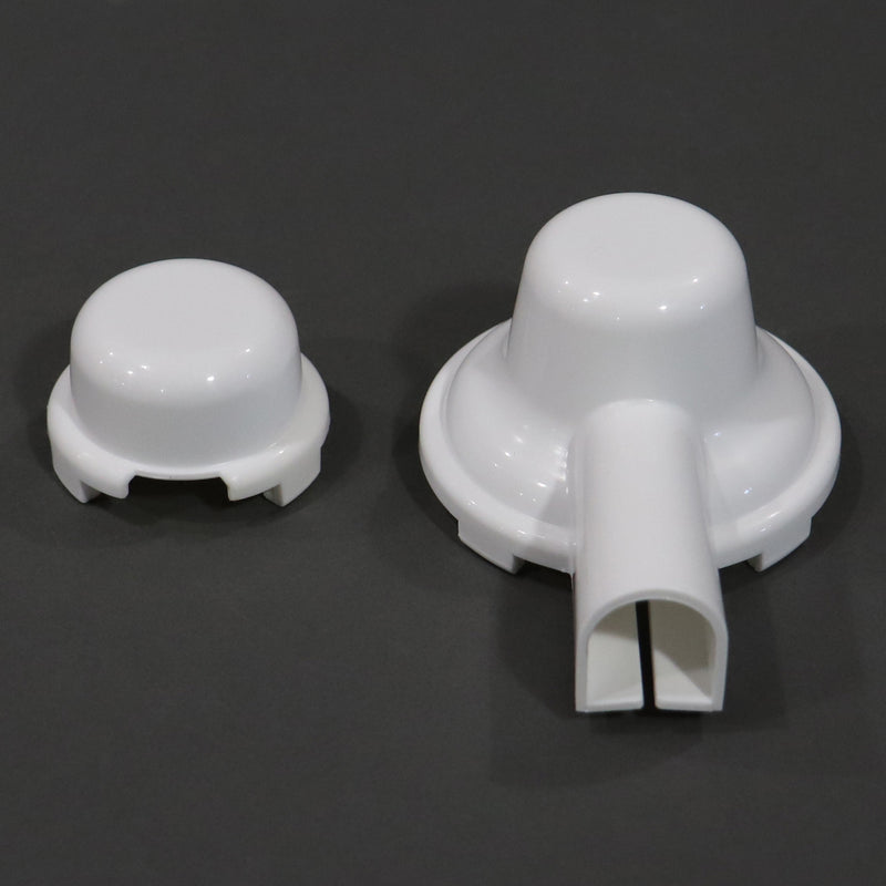 Two white plastic regulator covers designed for protecting LP gas regulators, displayed on a dark background.