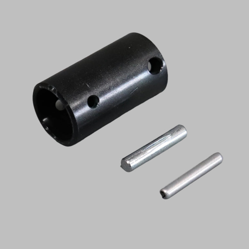 A black lift motor override adapter with a drive adapter and two pins, against a white background.