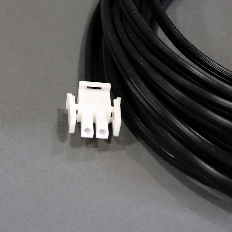 A black auto extension battery harness showing the battery connection 
