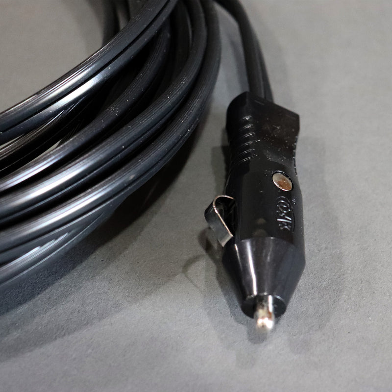 A black auto extension battery harness showing the cigar plug connection