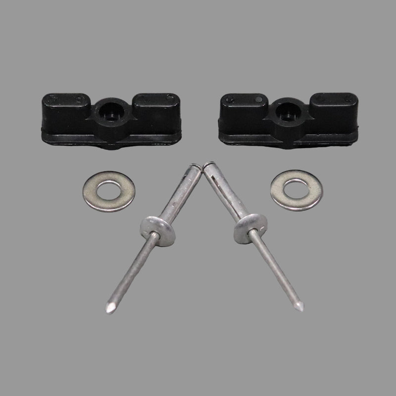 Two black latches with accompanying silver rivets and washers laid out on a grey surface.