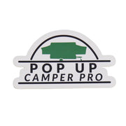 A decal with the text 'POP UP CAMPER PRO' and an illustration of a camper above the text.