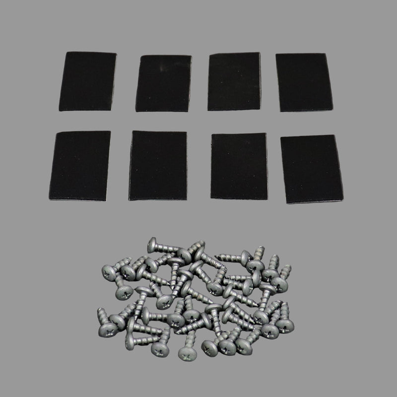 The image shows eight black self-adhesive pads and a pile of silver wood screws, part of a table leg installation kit.