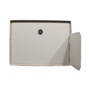 A white stove cover with a visible black knob handle on the front.