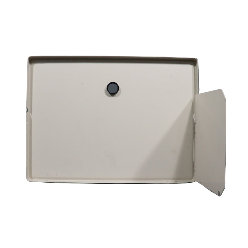 A white stove cover with a visible black knob handle on the front.